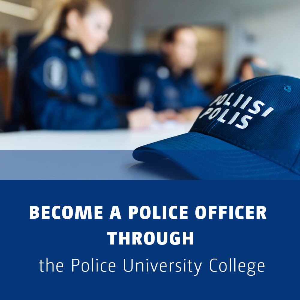 Police cap, with police students at their desk in the background. 